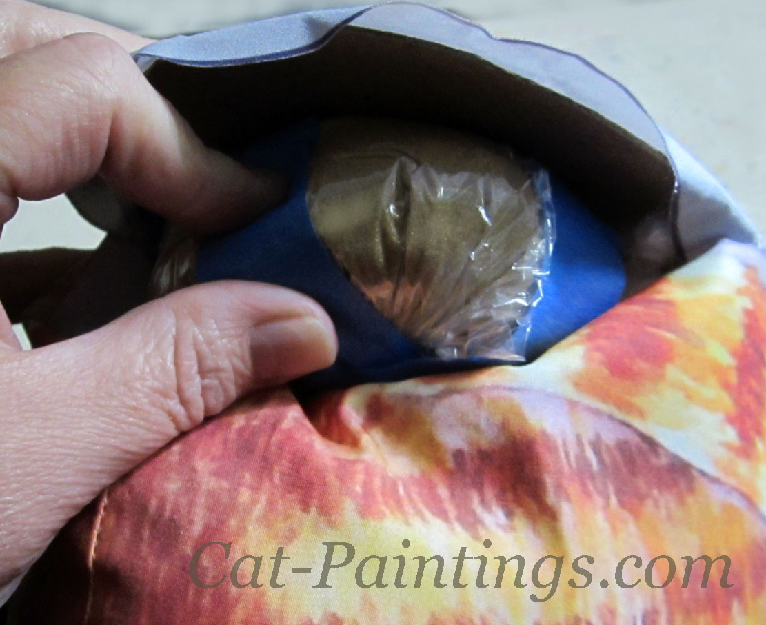 craft sand into base of pillow cat doorstop